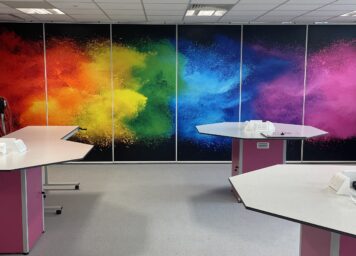 A colourful backdrop on the wall in a refurbished science room at Bradford College